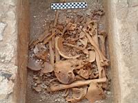 10 arranged bones in sarcophagus.jpg